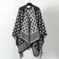 Stylish women's hooded knit poncho shawl with black and grey geometric pattern for winter - Black and White