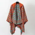 Knitted poncho shawl with geometric pattern in orange and turquoise split design - Orange