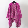 Women's purple hooded knitted poncho shawl featuring geometric patterns and stripes - Fuchsia Pink