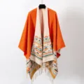 Bohemian geometric knit double-sided shawl cape with fringe in orange and cream - Orange