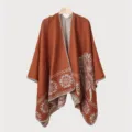 Detailed view of an autumn/winter men's knit shawl with ethnic patterns in burnt orange. - Caramel Feather Pattern Split Scarf
