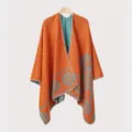 Close-up of orange and teal knitted shawl with ethnic patterns and premium stitch detail. - Orange Feather Pattern Split Scarf