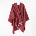 Detailed shot of a red knitted poncho shawl featuring a stylish diagonal strap design - 130*160cm / Burgundy