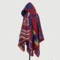 Detailed view of women's hooded ethnic knit poncho with intricate geometric patterns - Tribal Cipher Poncho - Red