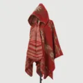 Red hooded knit shawl poncho featuring ethnic geometric patterns and side split design - Tribal Cipher Poncho - Rust Red