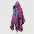 Detailed view of women's hooded knitted poncho with vibrant tribal patterns. - Cloak Tribe Code - Pink