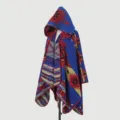 Detailed view of the tribal geometric pattern on this blue hooded knit poncho - Tribal Cipher Poncho - Blue