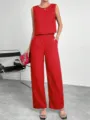 Detailed view of stylish red sleeveless top and wide-leg pants, elegant summer outfit. - S / Top And Bottom / Red