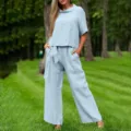 Outdoor scene detail featuring a stylish light blue casual two piece linen outfit outdoors. - S / Top And Bottom / Light Blue