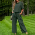 Detailed view of women's dark green short-sleeve crewneck top and wide-leg pants set. - S / Top And Bottom / Army Green