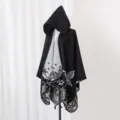 Detailed full view of black hooded knit poncho shawl with butterfly floral patterns - Robe / Black