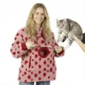 Pink fleece hoodie with red hearts and pet pouch, cozy pocket detail for cat owners, casual winter wear. - 4XL / Red Heart