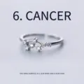 Macro detail of silver plated Cancer constellation ring with dimensions and zircon inlay - Adjustable Open / Cancer