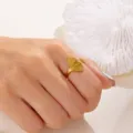 Eleganter vergoldeter Ginkgoblatt-Ring für Damen, hochwertiger Edelstahlschmuck - 金色款式七银杏叶(RI25Y0034)