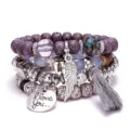 Bohemian 4-piece natural stone stackable bracelet set featuring wing charm, tassel and tags. - Gray