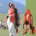 Ethnic style striped hooded poncho shawl with decorative border for travel - camel orange