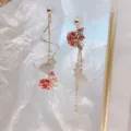 Elegant asymmetric gold-plated tassel earrings with red roses and white cat charms - Asymmetric Rose Cat Tassel (ER21Y0008)