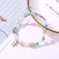 Bohemian shell bracelet with starfish charm and turquoise beads for summer beach vacations. - Natural Shell Turquoise Beads with Silver Starfish (BR24Y0115-2)