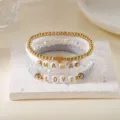 Exklusives Muttertags-Armband-Set aus Polymer-Ton und Kristall mit MAMA LOVE Perlen - Schwarz und Gold Stil (BR25Y0043-1)