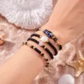 Juego de 4 pulseras de cuentas de moda con dijes de concha y peces de cerámica azul - Estilo negro, dorado y azul