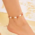 Bohemian summer beach anklet featuring starfish charm, white shells and orange stone chips - Anklet / Brown