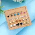 Lot de 12 paires de boucles d'oreilles mode avec motifs cœur étoile et lune - Lot Cœur Étoile Lune (ER24Y0075—5)