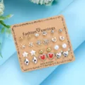 Lot de 12 paires de boucles d'oreilles tendance dorées et argentées avec cœurs et étoiles - Lot Cœur Rouge Étoile (ER24Y0075—6)