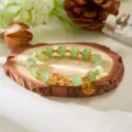 Exquisite 2025 Year of the Snake green bead bracelet with gold snake charm and Fu pendant - Light Green