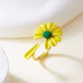Vibrant yellow daisy enamel open ring with a textured green center on a polished gold band - Ring / Yellow