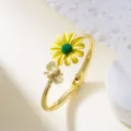Elegant gold bangle featuring a yellow daisy and a delicate bee charm for daily wear - Bangle / Yellow