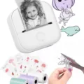 Tragbarer Mini-Thermodrucker mit Klebeetiketten-Rollen und kreativen Druckvorlagen. - Weiße Geschenkbox (inkl. weißem, grünem und violettem Verbrauchsmaterial) / Weiß