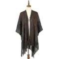 Elegant women's multi-color knitted poncho shawl with fringe hem detail on mannequin - 125x100cm / Black