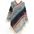 Colorful ethnic style knitted poncho for women featuring vibrant patterns and fringe detail - 85*80CM / Blue