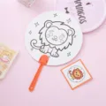 DIY coloring fan for kids with cute lion illustration and orange plastic handle - Lion