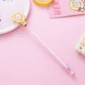 Cute pink gel pen with golden flower topper and crystal bead detail for students. - 0.5mm / Pink