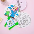 DIY graffiti hand fan kit for kids with green handles and cute raining cartoon pattern - Umbrella Lady