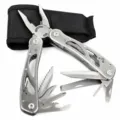 Stainless steel multi-tool folding pliers detail view with various blades and file attachments. - Silver