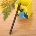 Cute black gel pen featuring a creative cartoon cat cap design for office and school use - 0.5mm / Black