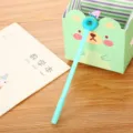 Light blue cartoon gel pen featuring a polar bear and donut topper design - 0.5mm / Blue