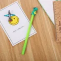 Stylo gel vert créatif doté d'un mignon dinosaure en caoutchouc souple pour écoliers - 0.5mm / Vert