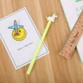 Cute light green gel pen featuring a cartoon unicorn topper for school stationery use. - 0.5mm / Yellow
