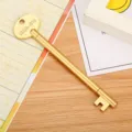 Elegante penna gel dorata a forma di chiave retrò con dettaglio KRD-315 in rilievo ufficio - 实心钥匙款(LJ-F258A) / Oro