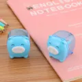 Adorable blue pig-shaped mini pencil sharpener for students, creative desk stationery gift - Light Blue