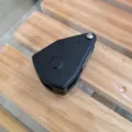 Vue détail tendeur de corde noir, ajusteur de cordon et poulie d'extérieur solide. - Poulie simple noire