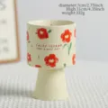 Ceramic scented candle holder, high-footed retro floral design, decorative table ornament. - Red Flower Candle Cup - Empty / Milk Yellow