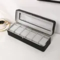 Détail d'un coffret à montres noir à 6 fentes avec cadre en métal et coussins gris - 6 Emplacements / Noir