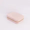 Close-up detail of a pink quilted travel jewelry storage box with golden zipper - 16.5x11.5x5cm / Light Pink