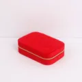 Detailed view of a red quilted velvet portable travel jewelry storage organizer box - 16.5x11.5x5cm / Red