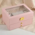 Vista dettagliata del portagioie in pelle rosa con coperchio in vetro a tre strati - 23*17*13.5cm / Rosa