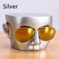 Golden aviator sunglasses with yellow mirrored lenses on silver mannequin stand - 19.8*18*11.3cm / Silver